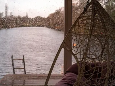 a window with a view of a body of water at Temple of Hedon Wellness Spa and Sleep in Ankeveen