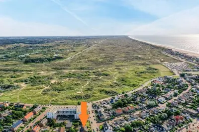 an aerial view of a city next to the ocean at The Dune house, Free parking in Zandvoort
