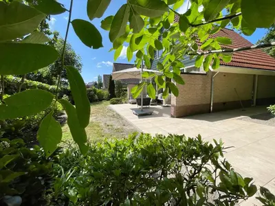 a view of the back yard of a house at Zon in de Duinen by Droomvilla in Sint Maarten