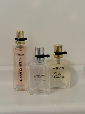 two bottles of perfume sitting on a counter at Casa Luz & Luna in Akersloot