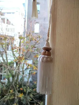 a santa claus ornament hanging from a wall at Miss Jordaan for Quiet Travellers in Amsterdam