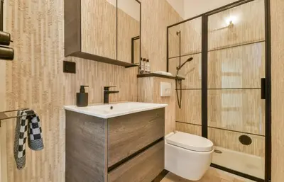 a bathroom with a sink and a toilet at Studio Pien Zandvoort in Zandvoort