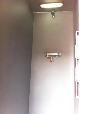 a door with a lock on a wall at Train Lodge Amsterdam in Amsterdam