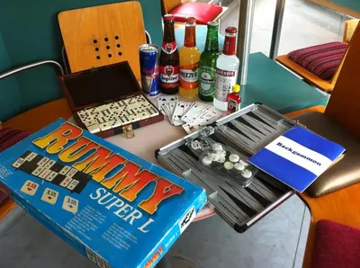 a table with a box and a laptop on it at Train Lodge Amsterdam in Amsterdam