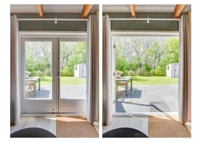 an open door with a view of a patio at Duynhof nabij Strand, duinen, bos en stad - 5 personen in Warmenhuizen