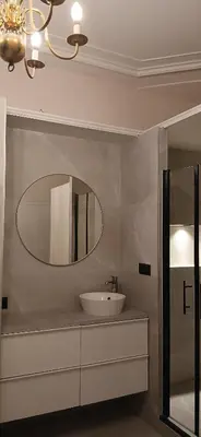 a bathroom with a sink and a mirror at Gouda city center apartment with private garden and 2 bicycles in Gouda