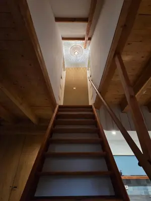 a staircase in a building with a ceiling at Ossestal in Assendelft