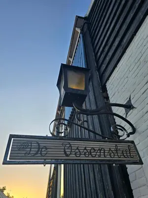 a street light on the side of a building at Ossestal in Assendelft