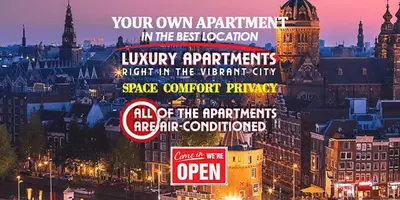 a group of signs in front of a city at The Amsterdam Hotel Apartment in the Center in Amsterdam