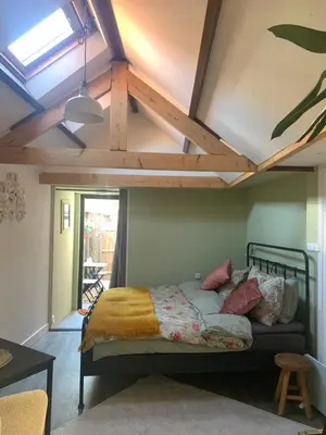 a bedroom with a bed in a room at Little Betsy in Zandvoort