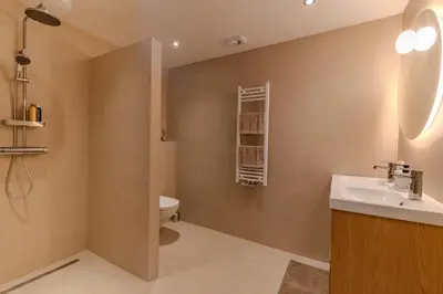 a bathroom with a sink and a toilet at City & Trainhouse in Alkmaar