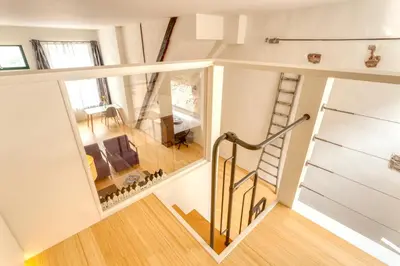 an overhead view of a staircase in a house at Voldersgracht Canal Home Haarlem in Haarlem