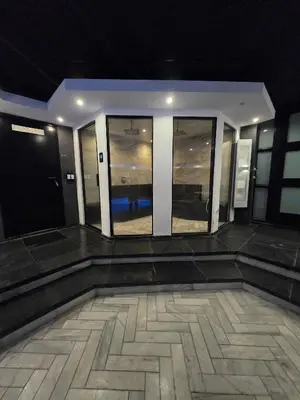 a empty room with a view of a building at Bed & Wellness Malina deluxe in Lelystad
