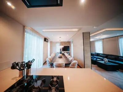 a living room with a couch and a table at Beautiful holiday home in Waarland in Waarland