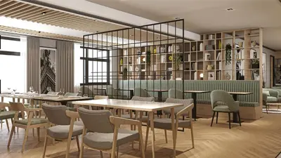 a dining room with tables and chairs and shelves at Radisson Hotel Amsterdam Schiphol Airport Hoofddorp in Hoofddorp