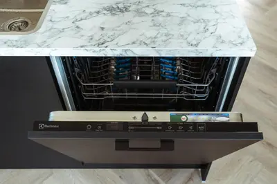 an oven with a white marble counter top at Kaag Villas in Warmond