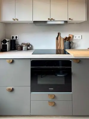 a kitchen with a black stove top oven at Moyeni in Zandvoort