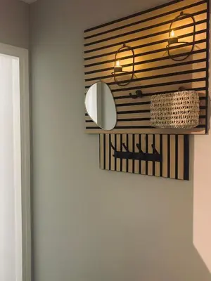 a mirror on a wall in a room at Duin 10 in Katwijk aan Zee
