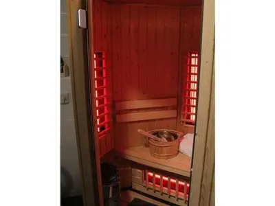 a small room with red lights in a japanese room at One-bedroom apartment in Heemskerk