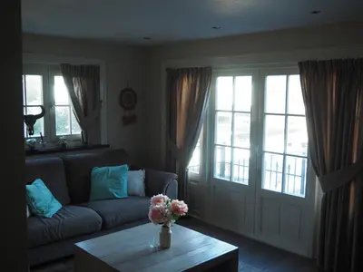 a living room with a couch and a coffee table at The perfect spot in Akersloot