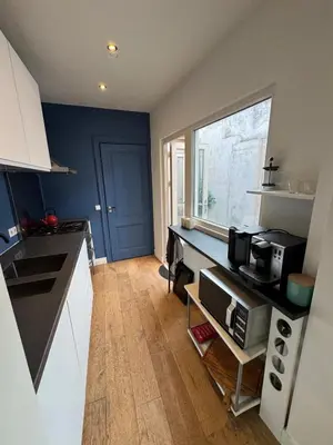 a kitchen with a counter top with a microwave at Cozy apartment in Utrecht in Utrecht