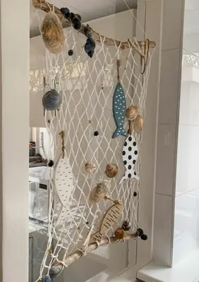 a rack with seashells and other items on it at Vakantiehuis Castor 300 m van het strand in Noordwijk aan Zee