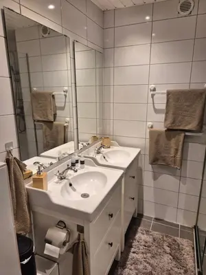 a bathroom with a sink and a mirror at Kintsugi in Alphen aan den Rijn