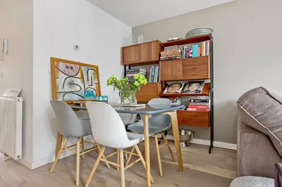 a dining room with a table and chairs at Charming Apartment in City Centre in Amsterdam