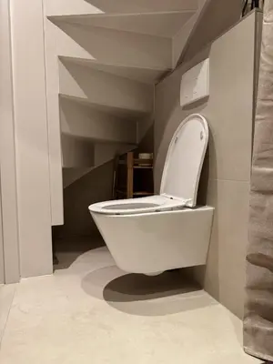 a bathroom with a toilet in a small room at C Studio Katwijk in Katwijk aan Zee