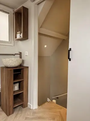 a bathroom with a sink and a counter at C Studio Katwijk in Katwijk aan Zee