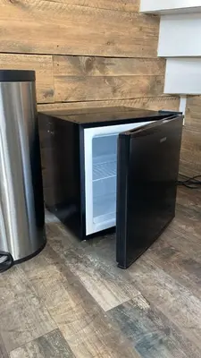 a microwave oven with its door open on the floor at Have e nice stay! - Juul 18, free parking in Noordwijk