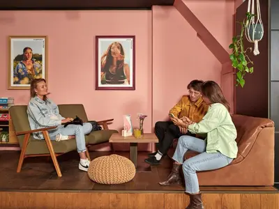 a group of people sitting in a room at CityHub Amsterdam in Amsterdam