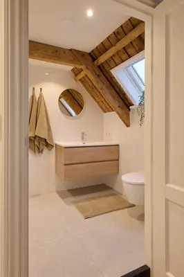 a bathroom with a sink and a toilet at Appartement C Rosita in Twisk