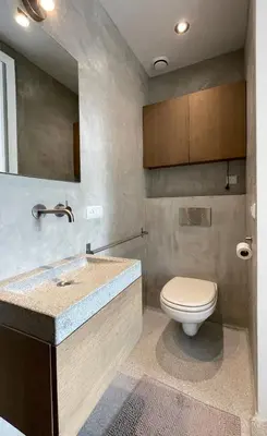 a bathroom with a sink and a toilet in it at Top Floor Apartment Vondelpark in Amsterdam