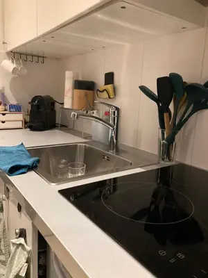 a kitchen with a sink and a counter top at Studio Mokum in Amsterdam