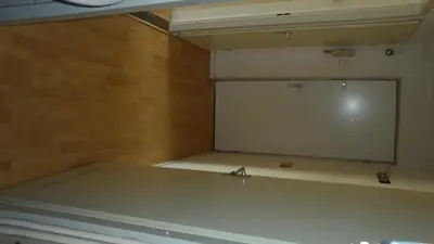 a room with a large projection screen in a room at Studio in Ons Belang