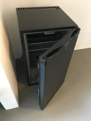 a black toaster oven sitting on top of a counter at Villa Yburg in Amsterdam