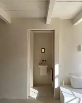 a white hallway with a sink in a room at Maison 1882 in Hauwert