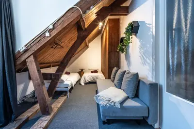 a living room with two couches and a loft at Private Estate Villa near Amsterdam with Hottub 12p in Abcoude
