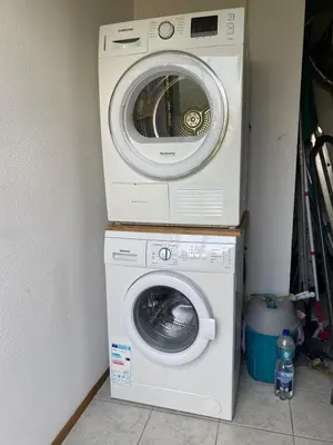 a dryer and a washing machine in a room at Villa-43 in Sint Maarten
