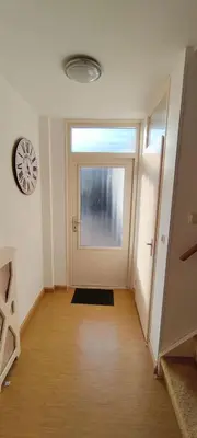 an empty room with a door and a window at Villa near Amsterdam in Almere