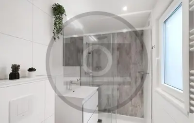 a white bathroom with a sink and a mirror at Cozy Home In Vinkeveen With Harbor View in Vinkeveen
