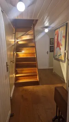 a hallway with stairs in a house at Cornelia Below Deck in Amsterdam