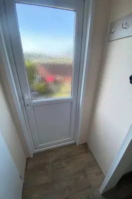 a door with a window in a room at Holiday Home Haus Jeff by Interhome in Wervershoof