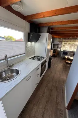 a kitchen with a sink and a stove at Apartment Haus Moony by Interhome in Wervershoof