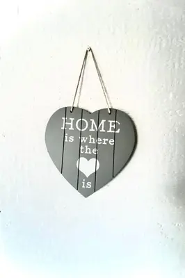 a heart shaped sign with the words divorce is whatever their life is at Holiday Home Isabella by Interhome in Wervershoof