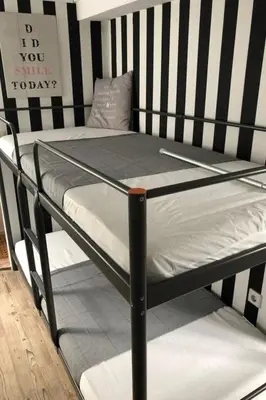 a black and white bunk bed in a room at Apartment Tami by Interhome in Wervershoof