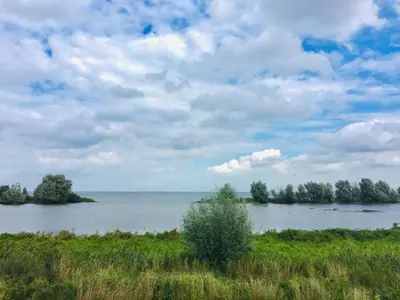 a view of a large body of water at Holiday Home in Wervershoof mit Sonniger Terrasse by Interhome in Wervershoof