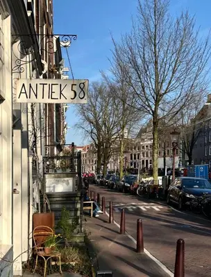 a street sign that reads antick on a city street at The Design apartment with canal-view in Amsterdam
