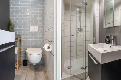a bathroom with a toilet and a sink and a shower at 2P studio in Utrecht city center in Utrecht